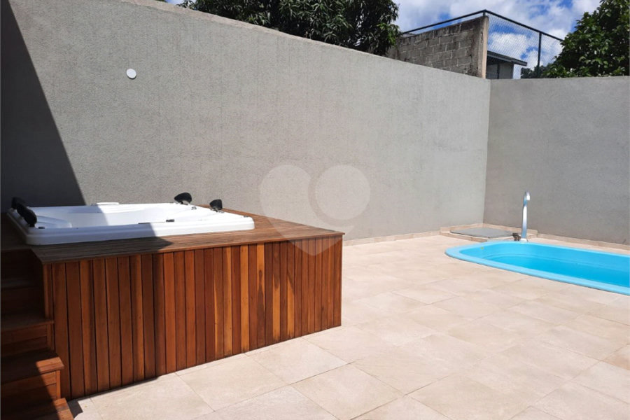 Casa à venda com 4 quartos, sendo 2 suítes, no condomínio Parque das Garças, Atibaia - SP