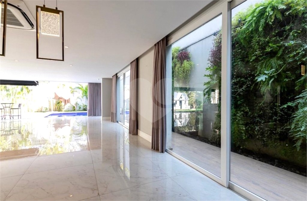 Casa à venda com 4 suítes no condomínio Hípica Garden, São Paulo - SP
