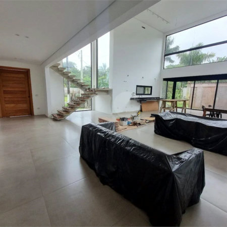 Casa à venda com 4 suítes no condomínio Park Lane, Guarujá - SP