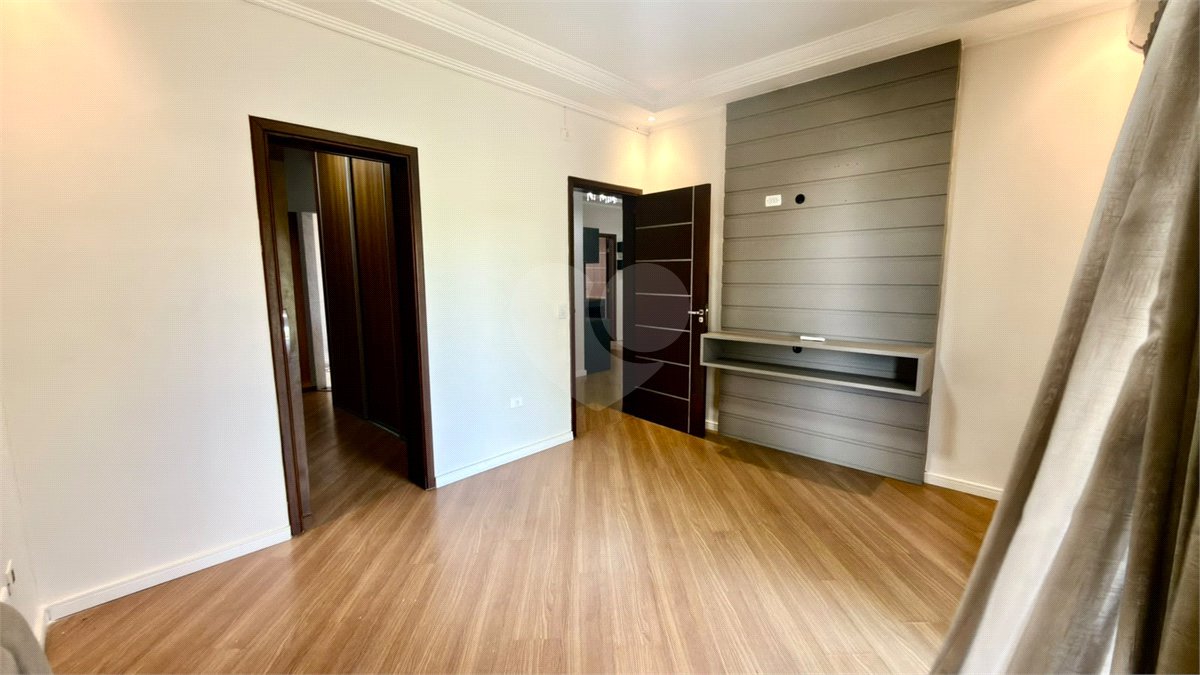 Casa à venda com 4 suítes no condomínio Parque Village Castelo, Itu - SP