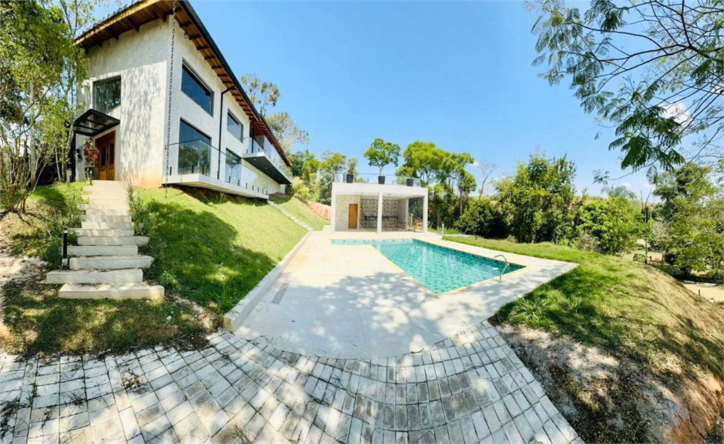 Casa à venda com 4 suítes no condomínio Associação Portal Ouro Verde, Atibaia - SP
