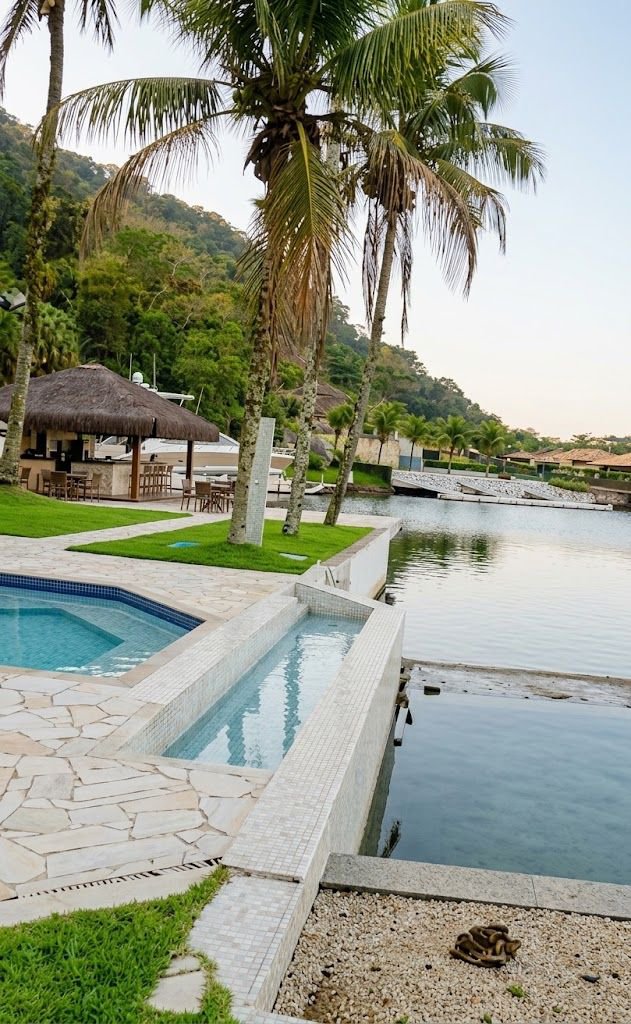 Casa com 5 dormitórios à venda, 900 m² por R$ 15.200.000,00 - Cidade Jardim Tom - Guarujá/SP
