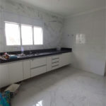Casa com 3 dormitórios à venda, 136 m² por R$ 970.000,00 - Ponta da Praia - Santos/SP