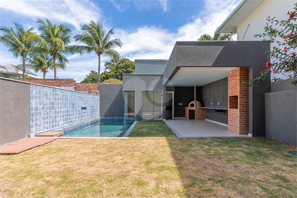 Casa à venda com 4 suítes no condomínio Riomar X, Rio de Janeiro - RJ