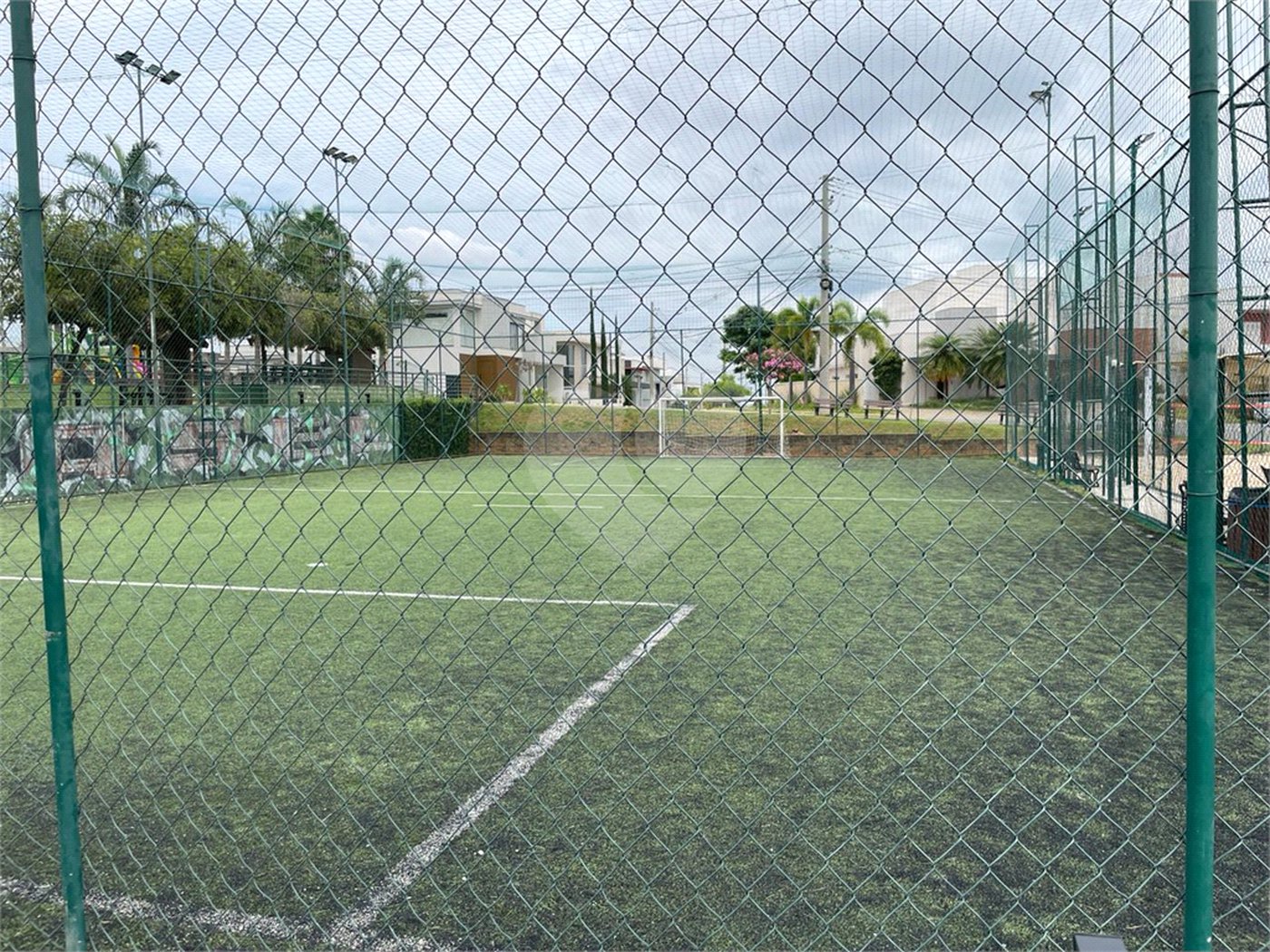 Casa à venda com 4 suítes no condomínio Basel, Campinas - SP
