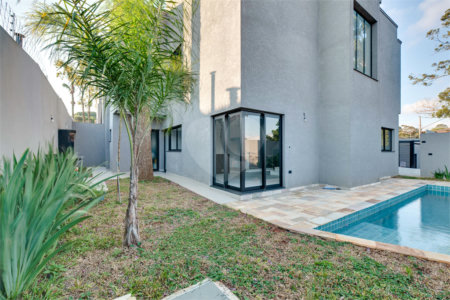 Casa à venda com 4 suítes no condomínio Reserva Robélia, São Paulo - SP