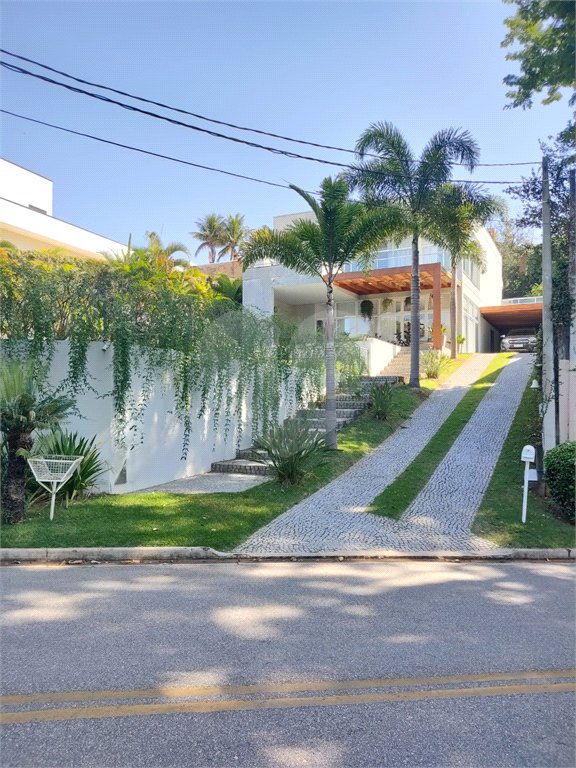 Casa à venda com 4 quartos, sendo 3 suítes, no condomínio Estância Marambaia, Vinhedo - SP