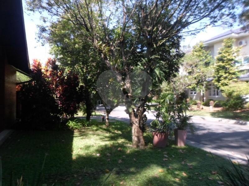 Casa à venda com 4 suítes no condomínio Jardim das Azaléias, São Paulo - SP