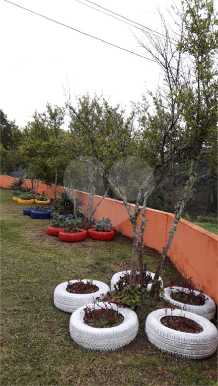 Chácara à venda com 8 quartos, sendo 3 suítes, no Centro, Toledo, MG