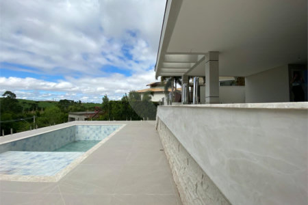 Casa à venda com 4 suítes em Residencial Jatibela, Campinas, SP
