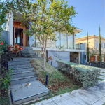 Indaiatuba - HOME DESIGN - Casa Térrea - Condomínio Paradiso - 420 m² de terreno - 307,19 m² de área construída - 3 suítes completas, sendo 1 master com closet planejado e banheira de imersão - Sala de TV reversível para 4ª suíte - Sala de estar ampla e varanda gourmet integrada - Cozinha com móve