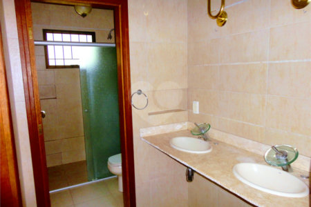 Casa à venda com 4 suítes no condomínio Estância Marambaia, Vinhedo - SP