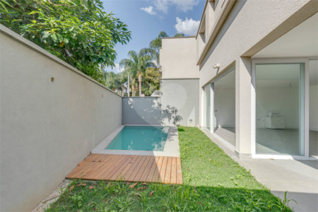 Casa à venda com 4 suítes no condomínio Vila Arese, São Paulo - SP