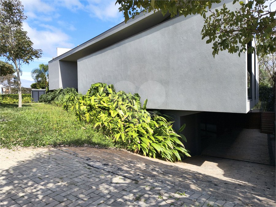 Casa à venda com 4 suítes no condomínio Alphaville Nova Esplanada 1, Votorantim - SP