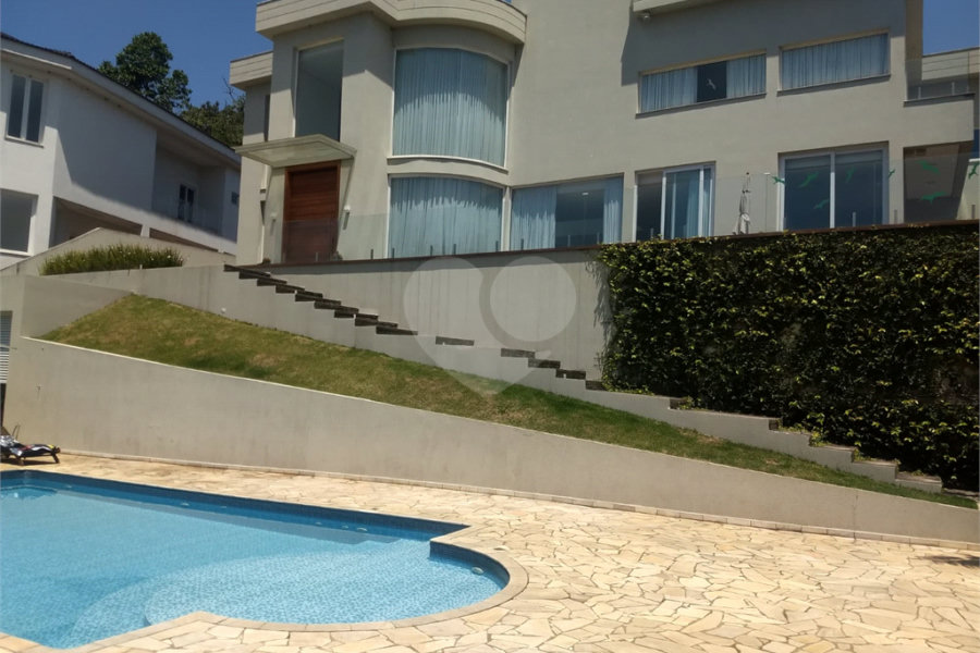 Casa à venda ou para alugar com 4 suítes no condomínio Suíça da Cantareira, Mairiporã - SP