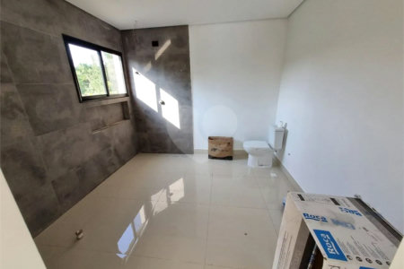 Casa à venda com 4 suítes no condomínio Park Lane, Guarujá - SP