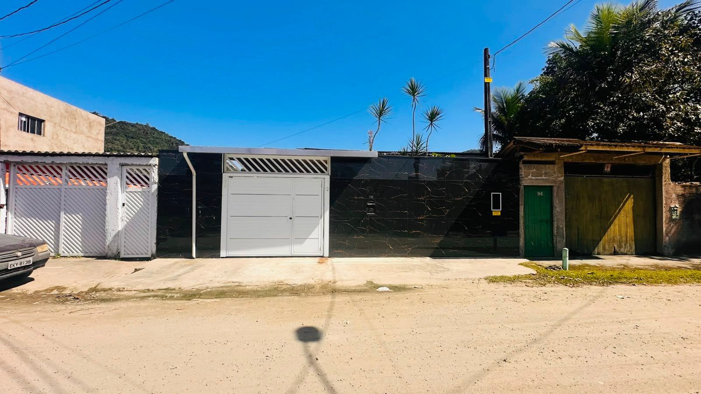Casa com 3 dormitórios à venda, 259 m² por R$ 450.000,00 - Caruara - Santos/SP