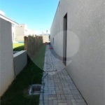 Casa à venda com 4 suítes no condomínio Figueira Garden, Atibaia - SP