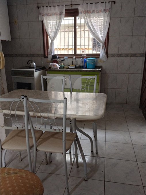 Casa à venda com 2 suítes, no condomínio Residencial Vitória Régia, Bertioga - SP