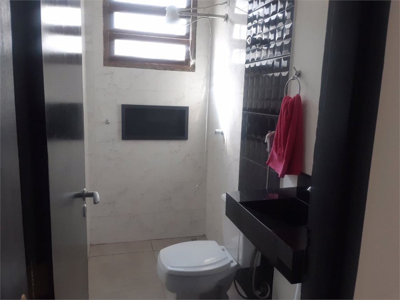 Casa com 4 dormitórios à venda, 180 m² por R$ 650.000,00 - Jardim Virginia - Guarujá/SP