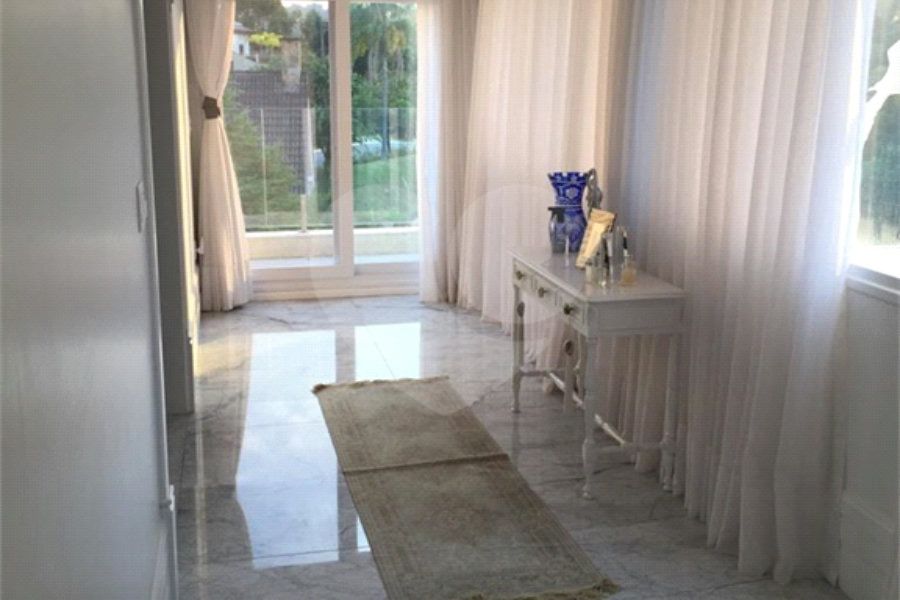 Casa à venda ou para alugar com 4 suítes no condomínio Suíça da Cantareira, Mairiporã - SP