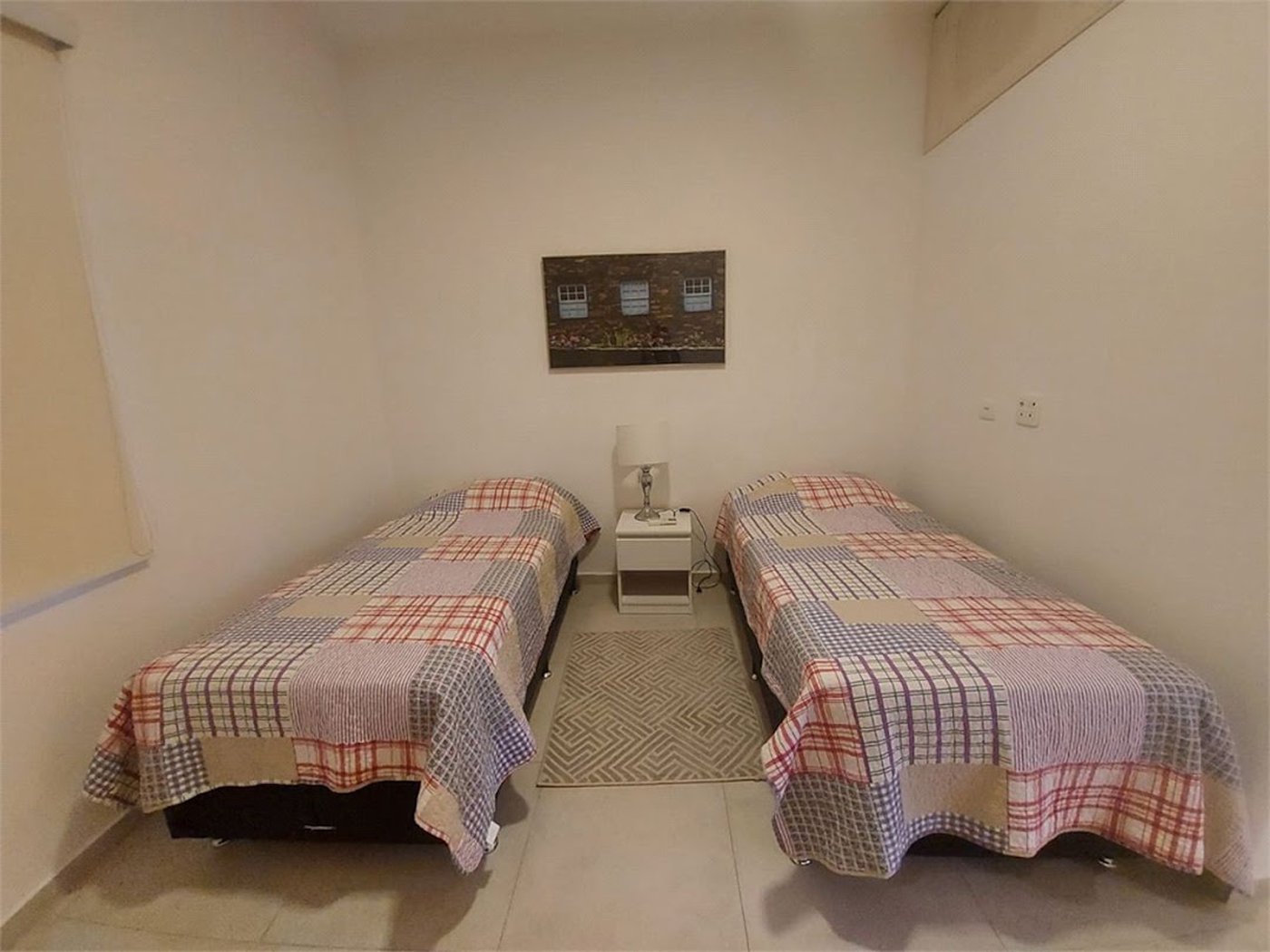 Apartamento com 4 dormitórios à venda, 120 m² por R$ 700.000,00 - Pitangueiras - Guarujá/SP