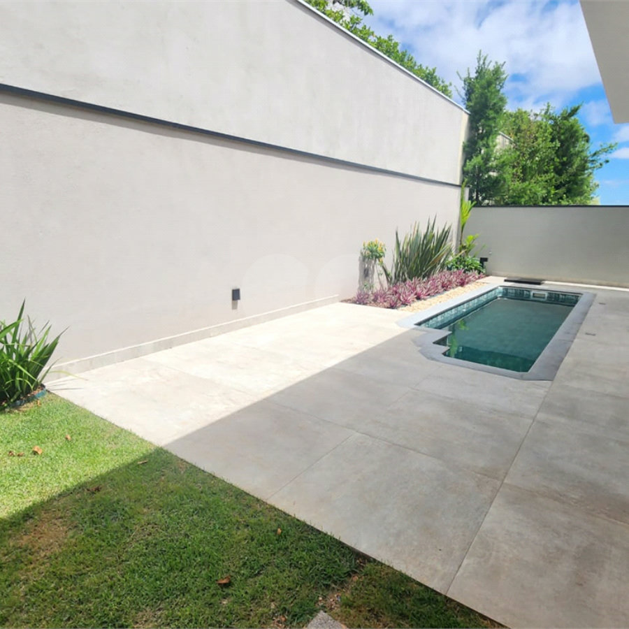 Casa à venda com 3 suítes no condomínio Terras de São Francisco, Vinhedo - SP