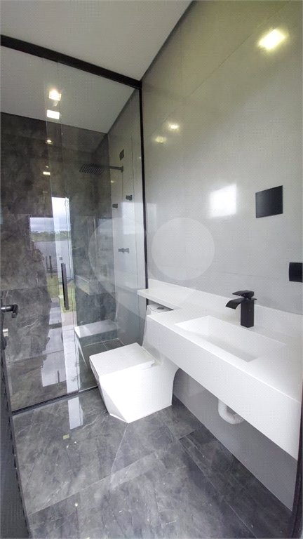 Casa à venda com 5 suítes no condomínio Figueira Garden, Atibaia - SP
