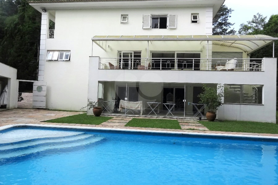 Casa à venda com 4 suítes no condomínio Residencial Jardim Itatinga, São Paulo - SP