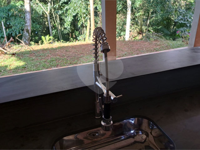 Casa à venda com 3 quartos, sendo 1 suíte,  no condomínio Alpes da Cantareira, Mairiporã - SP