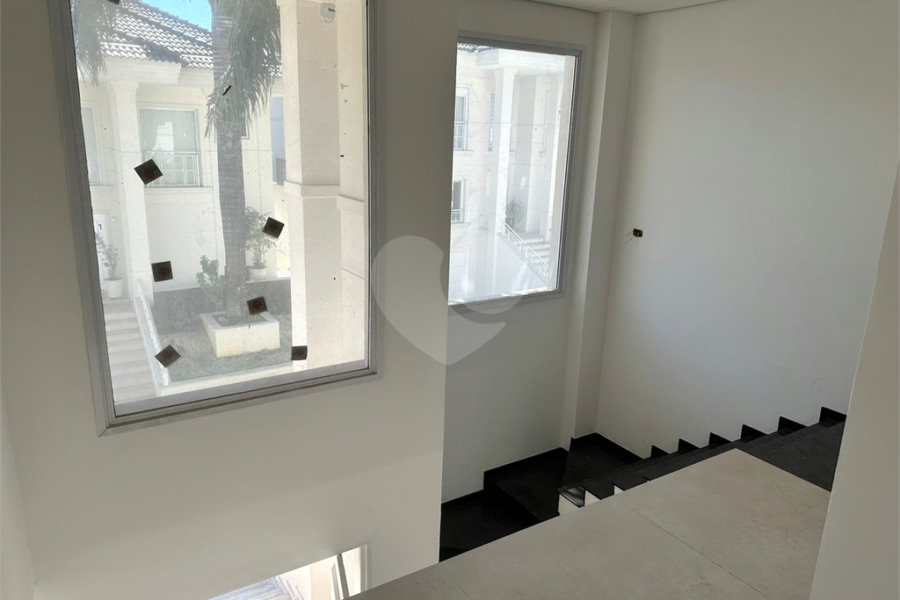 Casa à venda com 4 suítes no condomínio Villaggio Houda, São Paulo - SP