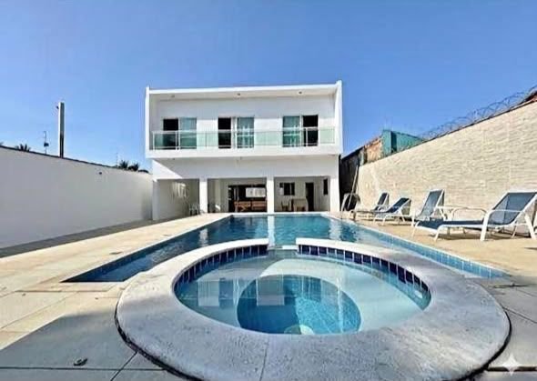 Sobrado à venda, 270 m² por R$ 1.010.000,00 - Balneário Praia do Pernambuco - Guarujá/SP