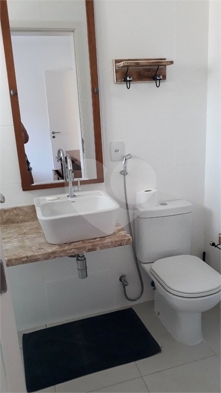 Casa à venda com 4 quartos, sendo 3 suítes, no condomínio Residencial Vila Esmeralda, São Sebastião - SP