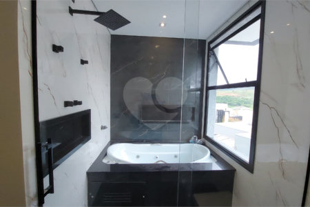 Casa à venda com 5 suítes no condomínio Figueira Garden, Atibaia - SP