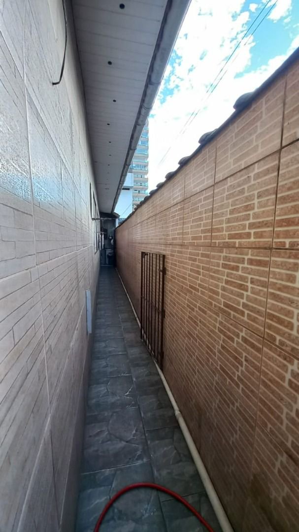 Casa com 2 dormitórios à venda, 100 m² por R$ 700.000,00 - Vila Guilhermina - Praia Grande/SP