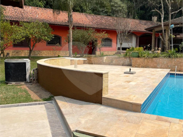 Casa à venda ou para alugar com 4 suítes no condomínio Alpes da Cantareira, Mairiporã - SP