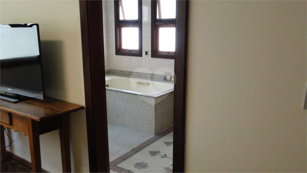 Casa à venda ou para alugar com 4 suítes no condomínio Estância Marambaia, Vinhedo - SP