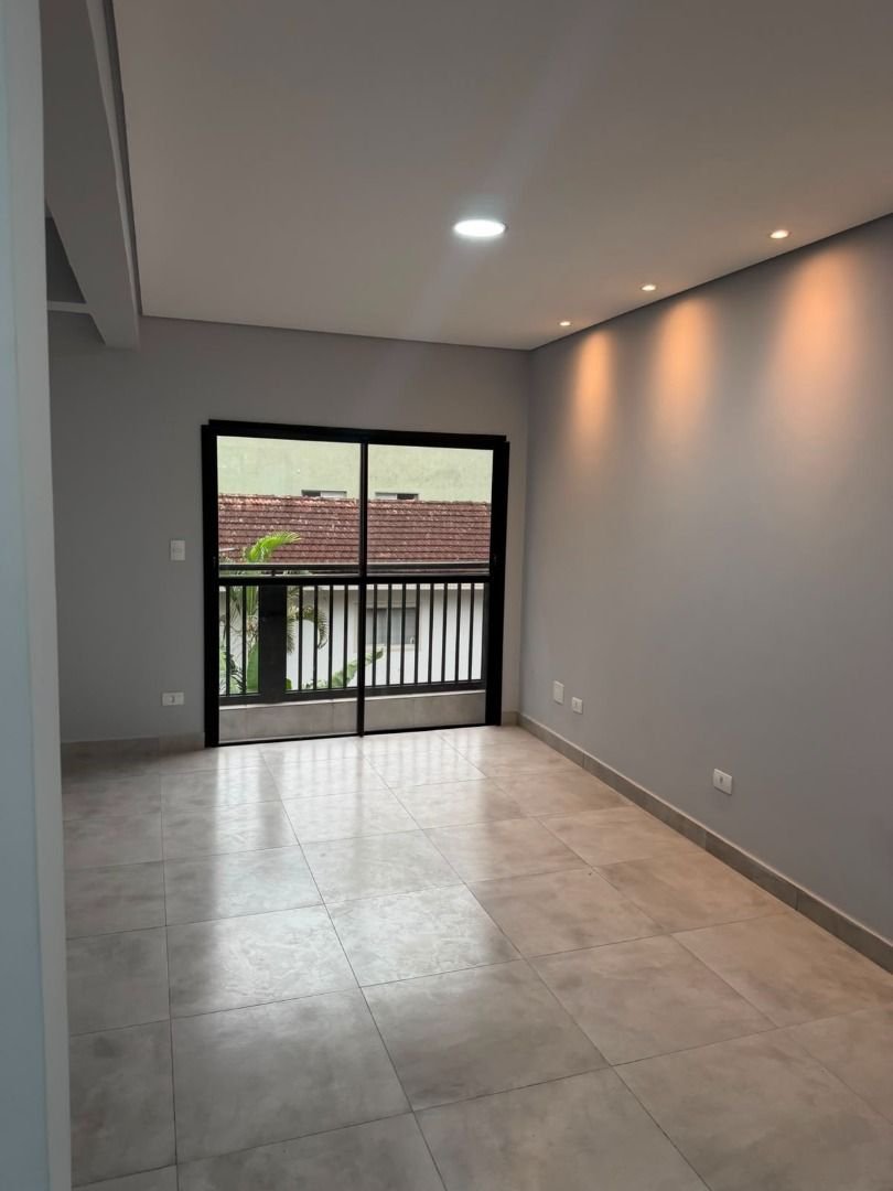 Casa com 2 dormitórios à venda, 116 m² por R$ 650.000,00 - Marapé - Santos/SP