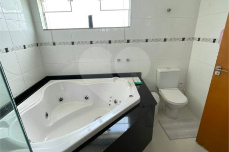 Casa à venda com 4 suítes no condomínio Aruã Lagos, Mogi das Cruzes - SP