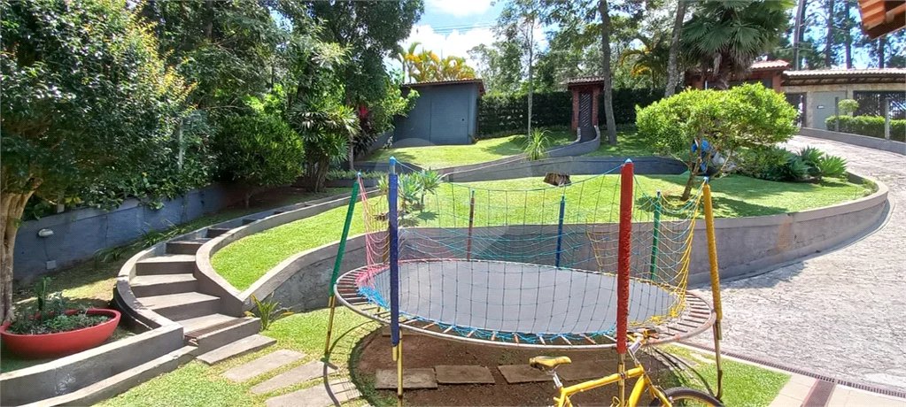 Casa à venda com 4 suítes no condomínio Alpes da Cantareira, Mairiporã - SP