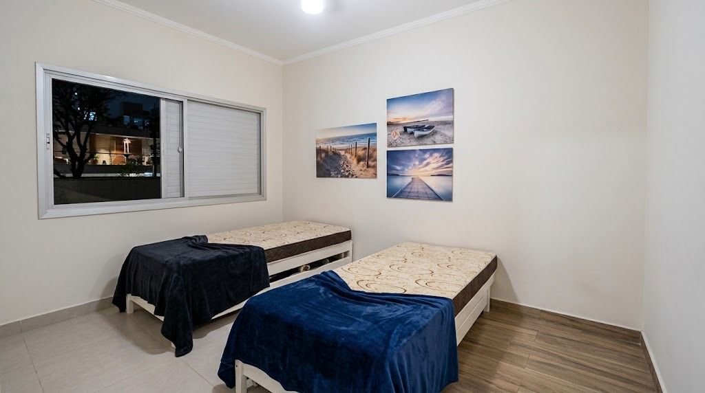 Apartamento com 2 dormitórios à venda, 76 m² por R$ 365.000,00 - Vila Júlia - Guarujá/SP