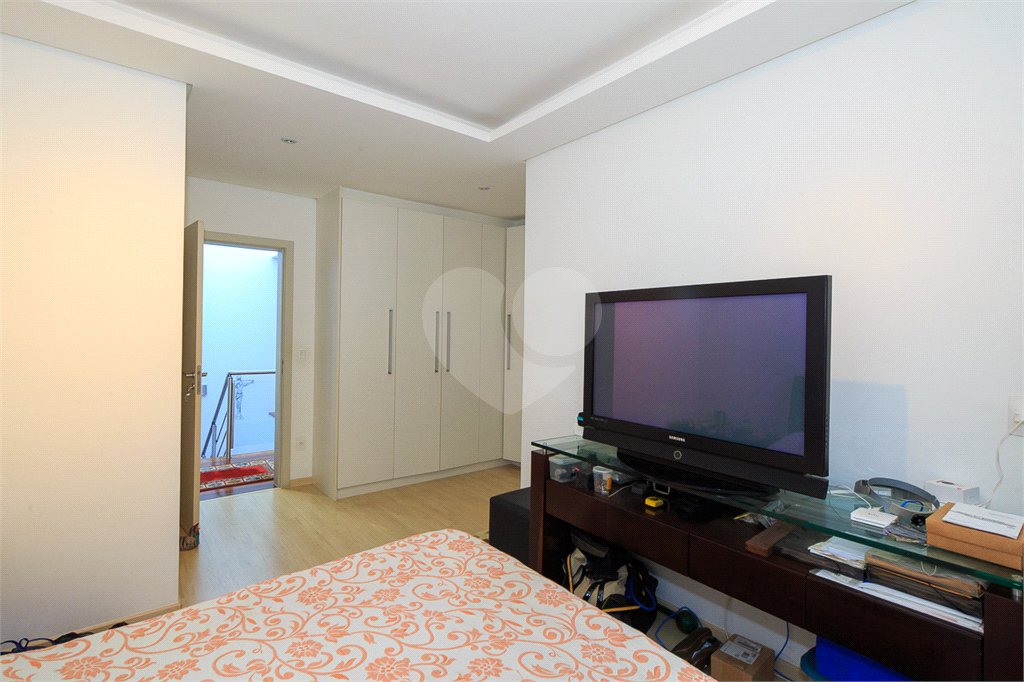 Casa à venda com 4 suítes no condomínio Vila Alba, São Paulo - SP