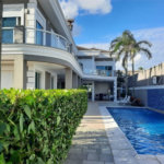 Casa com 6 dormitórios à venda, 700 m² por R$ 10.000.000,00 - Loteamento João Batista Julião - Guarujá/SP