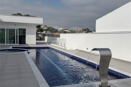 Casa à venda com 4 suítes no condomínio Estância Marambaia, Vinhedo - SP