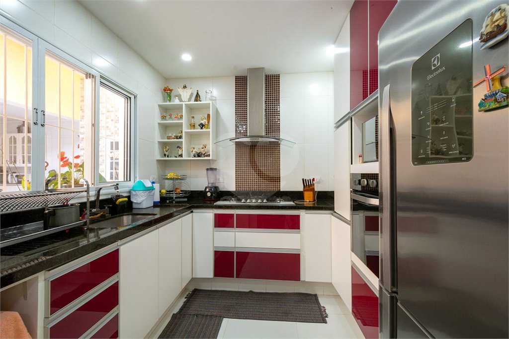 Casa à venda com 4 quartos, sendo 1 suíte, em Santo Amaro, São Paulo, SP