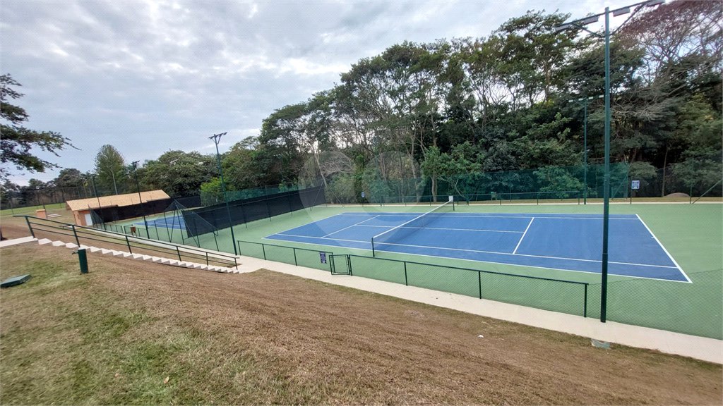 Casa à venda com 4 suítes no condomínio Figueira Garden, Atibaia - SP