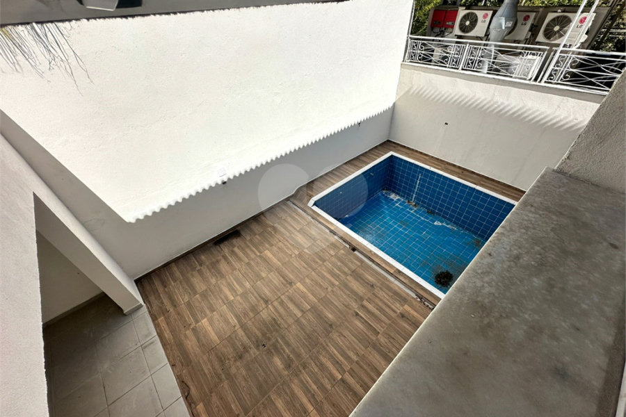 Casa à venda com 4 suítes no condomínio Villaggio Houda, São Paulo - SP