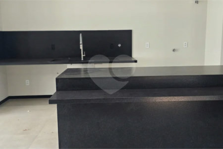 Casa à venda com 5 suítes no condomínio Parque Faber IV, São Carlos - SP