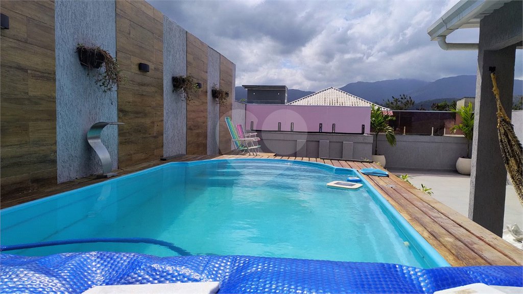Casa à venda com 3 quartos, sendo 2 suítes, no condomínio Planície do Araguaia, Rio de Janeiro - RJ