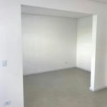 Casa com 3 dormitórios à venda, 116 m² por R$ 690.000,00 - Gonzaga - Santos/SP